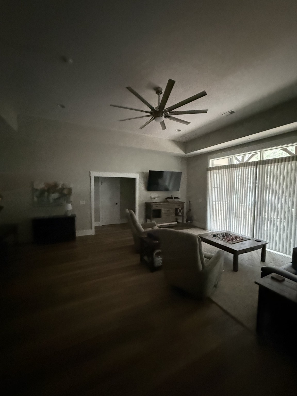 Second view of ceiling fan and recessed lighting in a living room